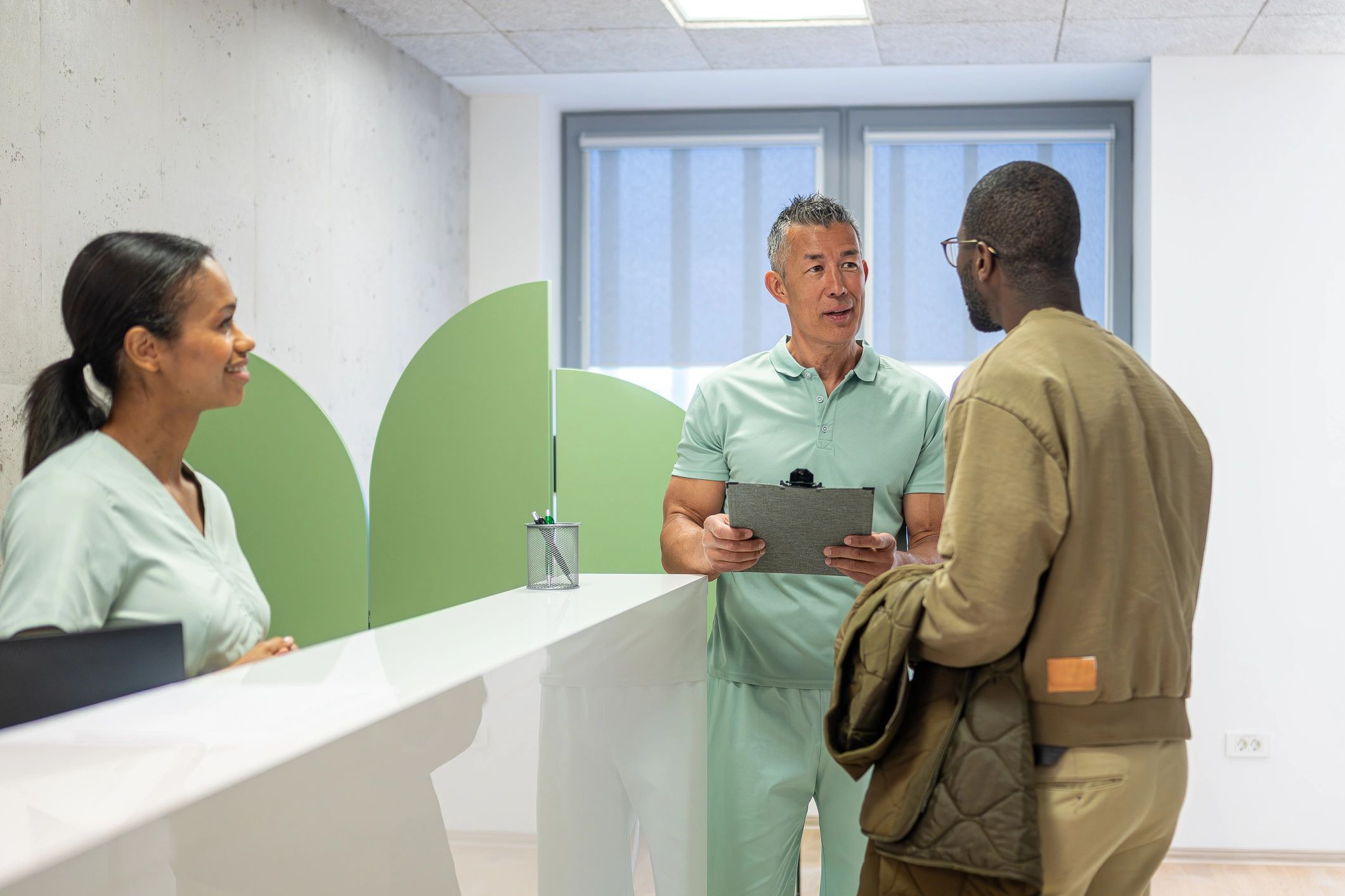 Private clinic consultation between healthcare professional and patient